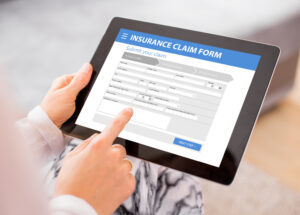 filing an insurance claim for storm damage after receiving emergency board-up services